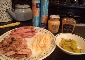 The ingredients: pork, swiss cheese, ham, crescent rolls and mustard.